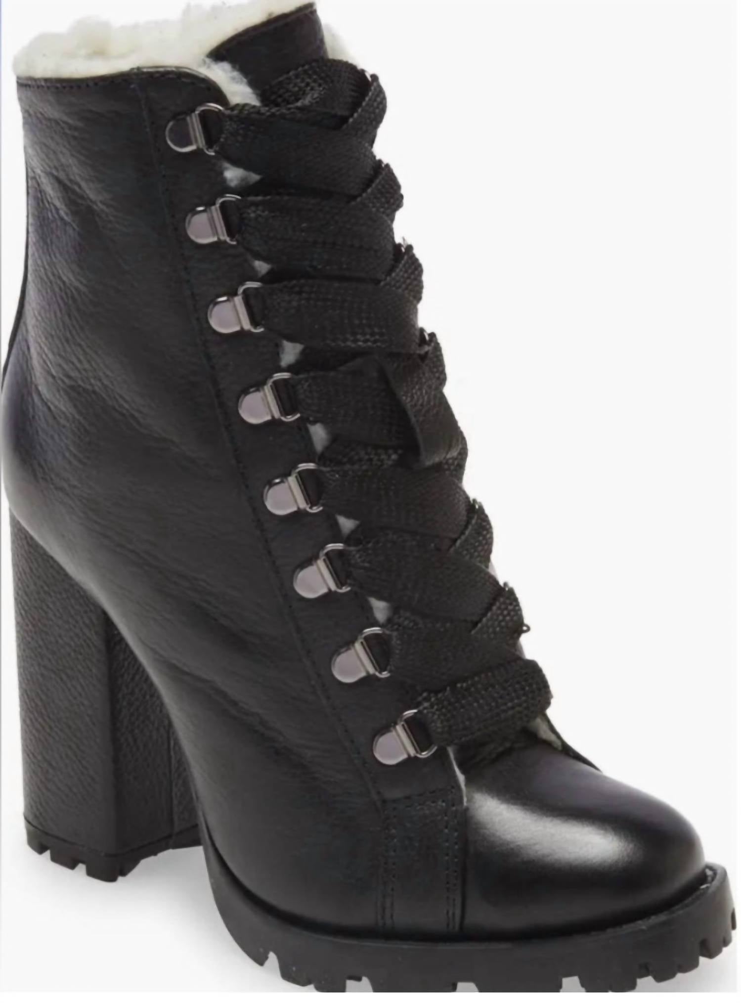 d4b7f025-459e-4f96-a02c-9d60a5157fe8-upscale_15k-1500x1500-70 Schutz - Women's Zhara Combat Lug Sole Lace Up Bootie - Image 1